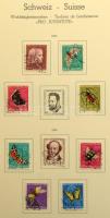 Svájc 1945-1974 Pro Juventute és Pro Patria 237 db bélyeg + 2 db blokk előnyomott, nagyalakú Leuchtturm albumban, zöld rugós borítóval