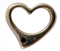 Arany (Au) medál, 14k, benne kisméretű gyémánt, bruttó 0,64g