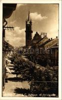 1940 Beszterce, Bistritz, Bistrita; Strada I. C. Bratianu / Spitalgasse / Kórház utca, Czitron üzlete, Evangélikus templom / street view, shops, Lutheran church + "1940 Beszterce visszatért" So. Stpl.