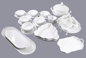 Herendi fehér 26 részes szervírozó garnitúra, leveskínáló, 3 darab szószos edény, 6 darab leveses csésze alátéttel (a csészéken repedéssel), 8 darab kínáló, közte lábakon álló. Kosárfonott peremrésszel, masszába nyomott, illetve elcsiszolt jelzésekkel, kis kopással.