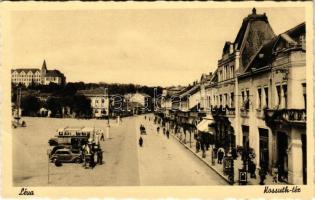 Léva, Levice; Kossuth tér, üzletek, autóbusz, automobil / square, shops, autobus, automobile (gyűrődés / crease)