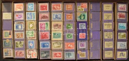 ~1850-1960 Több ezer magyar bélyeg először kiadásonként, majd címletenként rendezve, kb. 700 db összekapcsolt gyufásdobozban + azokra ragasztva, bündlikezdeményezés céljára, nagy dobozban