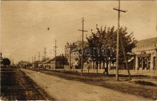 Csongrád, Fő tér, gyógyszertár, üzletek. photo