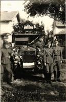Kolozsvár, Cluj (?); bevonulás, Tábori Postahivatal postakocsija katonákkal / entry of the Hungarian troops, Field Post Office automobile with soldiers. photo + "1940 Kolozsvár visszatért" So. Stpl. + "1940 Beszterce visszatért" So. Stpl. "TÁBORI POSTAHIVATAL 2 A" (EK)
