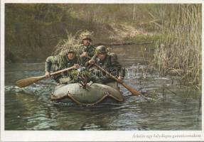 Military WWII Crossing a river by an inflatable boat