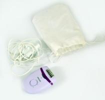 Philips női borotva, tartójában.