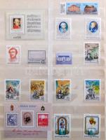 Közepes bőrönd tele bélyegekkel közte postatiszta magyar gyűjteményrészek, áztatott és áztatni való ...