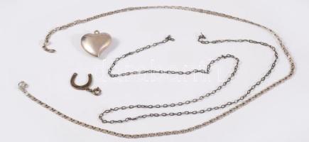 Kis ezüst tétel: 2 db nyaklánc + 2 db medál (szív, patkó), részben jelzett, összesen 12,7 g