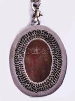 Ezüst (Ag) nyaklánc, faragott lakk berakásos zománcozott ezüst (Ag) medállal, jelzett, bruttó 10,5g