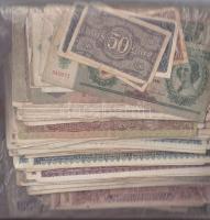 250 darabos papírpénz tétel 80% magyar: 12 db Korona időszak, pár forint, a többi pengő időszak. + kb 40 háború utáni román, lengyel, jugoszláv, észt bankjegy T: II, III, IV. / Mixed HUngarian and foreign banknote lot