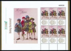 2025 Boldog Karácsonyt! megszemélyesített ív tokban