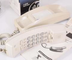 Vezetékes telefon, papírjával, dobozában