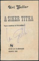 Uri Geller (1946-) izraeli-brit mentalista, előadóművész aláírása egy könyve címlapján (csak címlap)