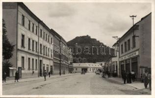 Huszt with Vinohradi savings bank, pharmacy and the castle ruins photo
