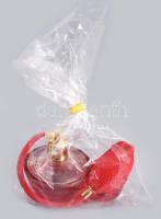 Újszerű parfümös üveg, csomagolásában.