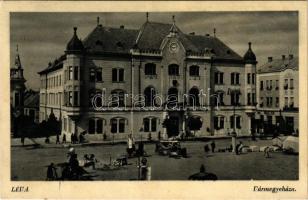 1943 Léva, Levice; Vármegyeháza, piac, Tóth Miklós üzlete. Hadjú foto / county hall, market, shops