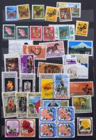 Új-Zéland tétel, benne kb 380 db bélyeg 10 fekete lapos közepes berakóban