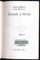Blixen, Karen: Árnyék a füvön. 1998, Kávé Kiadó. Kiadói papírkötés, műanyag védőborítóval, jó állapo...