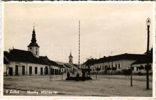 Zsibó, Jibou; Horthy Miklós tér, Országzászló, Dizmacsek hentes és mészáros, Katz Adolf üzlete. Végh Dávid kiadása / square, Hungarian flag, butcher, shops (EK)