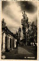 1940 Nagybánya, Baia Mare; utca, templom, Özv. Varjasi Károlyné okleveles szülésznő rendelője / street view, church, midwife's office + "1940 Nagybánya visszatért" So. Stpl. (EK)