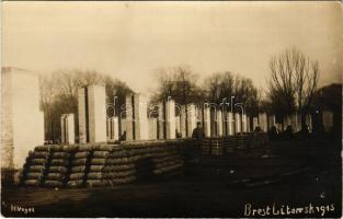 1915 Brest, Brest-Litowsk; WWI German military, artillery depot with soldier. H. Vogel photo (fl)