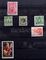 16 lapos ALPHA közepes berakó, benne külföldi bélyegek, FDC-k, CM-ek