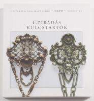 Czirádás kulcstartók. Tandem Grafikai Stúdió Anno sorozata. Bp., én., Tandem Grafikai Stúdió. Gazdag képanyaggal illusztrált. Kiadói papírkötésben, újszerű állapotban.