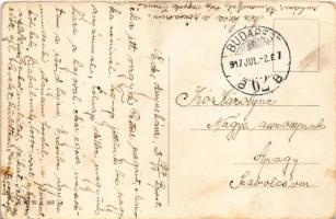 1917 Child with ink and photo album. B.K.W.I. 587-4. s: August Patek (EB)