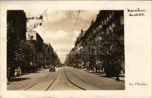 1944 Warszawa, Warschau, Warsaw, Varsó; Marschallstrasse / street view, automobiles, trams, shops. Fot. F. Gazda