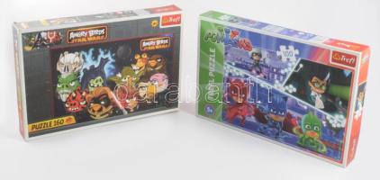 2 doboz teljes, jó állapotú puzzle.