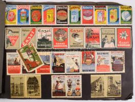 Régi különféle levélzárók, nagyrészt I. világháború előttiek, albumba ragasztva, 12 lapon kb. 300-400 db, közte reklám és propaganda. Haránt-alakú zsinórfűzött albumban, kopott, sérült albumban, a képek között sérült, és foltos is. /  Collection of poster stamps, mostly before world war I, glued in folder, on 12 pages, cca. 300 - 400 pc., advertisment and paraganda poster stamps. With worn and damaged folder, with some spotty and damaged poster stamsp.