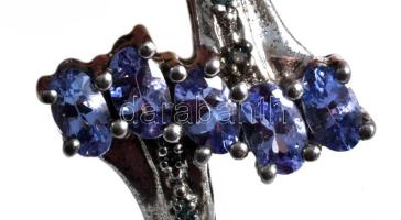 Ezüst (Ag) gyűrű, lila kövekkel, m:60, bruttó 3,8g