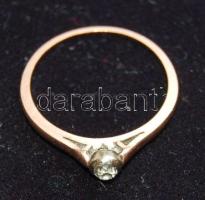 Brill berakásos női 14K arany (Au) gyűrű, bruttó 1,7g / Golden (14K) ring with brill inlay