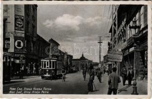 Újvidék, Novi Sad; Ulica Kralja Petra / utca, villamos, üzletek / street view, tram, shops + "1941 Újvidék visszatért" So. Stpl. (kis szakadás / small tear)