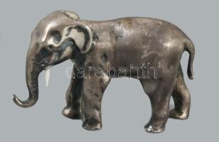 Ezüst (Ag) elefánt figura, cca 20. sz. eleje, német, jelzett, 1888 utáni német hold korona fémjel, csont agyarakkal, 6x4 cm, bruttó 116g