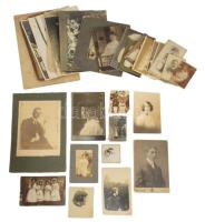 cca 1900-1930 Vegyes fotó tétel, közte keményhátú fotók, fotólapok, portrék, csoportképek, stb., összesen kb. 30 db, változó méretben és állapotban