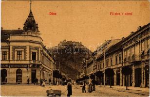 Déva, Fő utca a várral, Fehér Kereszt szálloda, gyógyszertár, Mallász, Hirsch Testvérek üzlete. Kroll Gyula kiadása / main street, castle ruins, hotel, pharmacy, shops (EK)