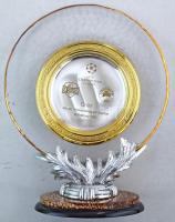 2001. műanyag, üveg és fém emléktárgy a 2001. február 14-én lejátszott SK Sturm Graz - Panathinaikos FC UEFA Bajnokok Ligája csoportkörös mérkőzésről. A grazi csapat a mérkőzést 2-0-ra megnyerte. Magyar érdekeltség is volt a találkozón, Korsós György végigjátszotta, Szabics Imre pedig csereként jutott szóhoz. ~34x28cm