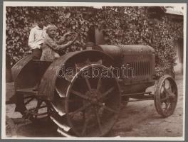 cca 1910-1920, Gyerekek McCormick traktorral, későbbi előhívás - nagyítás (cca 1920-1930), fotó kartonon, 24x18 cm