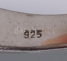 Ezüst (Ag) gyűrű kék topázzal, m:55, jelzett, bruttó 4,8g