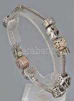 Ezüst (Ag) karkötő Pandora jelzéssel, charmokkal, h: 21 cm, bruttó: 32,7 g