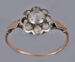 Arany (Au) gyűrű, 1872-1937 közötti fémjel, 14 karátos arany, ezüst foglalatban középen cca 0,3ct sérült brillel, körben 7 darab sérült brill cca 0,35ct, egy kő hiánnyal, m: 55, bruttó 1,7g