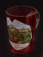 cca 1900 Segesvári emlékpohár, tájképpel díszítve, részben anyagában színezett üveg, fülénél repedés...