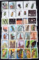 Madagaszkár 514 db klf bélyeg, 16 db blokk és 1 db kisív, közte 71 db komplett kiadás, 8 fekete lapo...