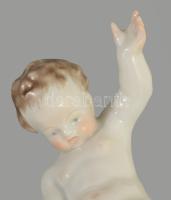 Herendi pisilő puttó. Terv.: Nemes György. Kézzel festett, jelzett, hibátlan, m: 18 cm