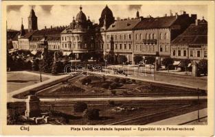 Kolozsvár, Cluj; Piata Unirii cu statuia lupoaicei / Egyesülési tér a Farkas szoborral, üzletek, bank (EB)