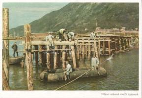 Military WWII German construction workers bulding a molo