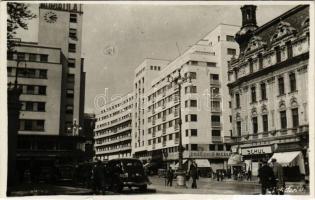 Bucharest, Bukarest, Bucuresti, Bucuresci; street view with Grand Hotel, drugstore, shops of Dragomi...