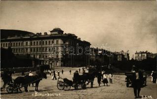 Vladivostok, Vlagyivosztok; street view with horse-drawn carriages, tram, pharmacy. photo