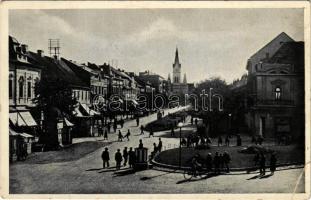 1938 Munkács, Mukacheve, Mukacevo; Masarykova ulice / Masaryk utca, kerékpár, üzletek / street view,...